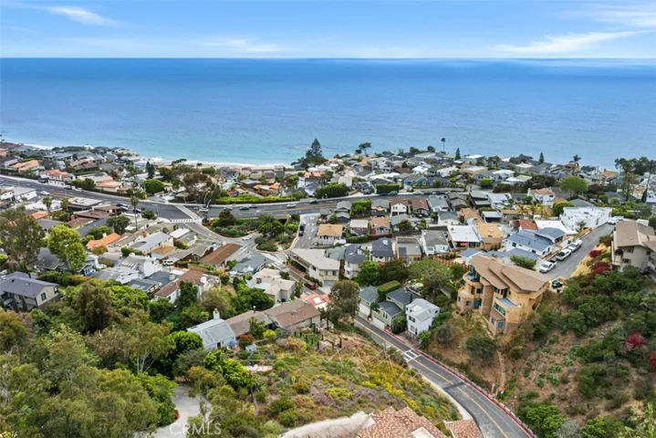 Proximity to the beach allows you ocean breezes, views and walking to restaurants, coffee, the Montage Laguna Beach, etc. Please note, this image shows two lots. Lot for sale is closest to the ocean. Fencing in front shows the lot for sale.