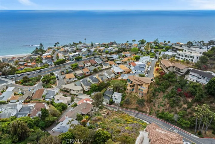 Facing North.  Please note, this image shows two lots. Lot for sale is closest to the ocean. Fencing in front shows the lot for sale. More photos coming