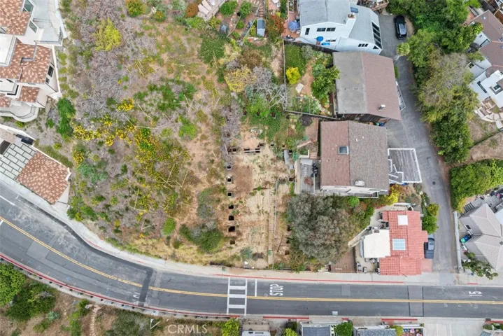 Arial photo directly above the property.  Please note, this image shows two lots. Lot for sale is closest to the ocean. Fencing in front shows the lot for sale.