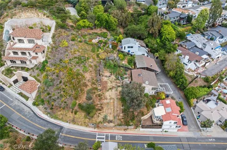Lot in a beautiful location in an area already developed with beautiful homes.  Please note, this image shows two lots. Lot for sale is closest to the ocean. Fencing in front shows the lot for sale.
