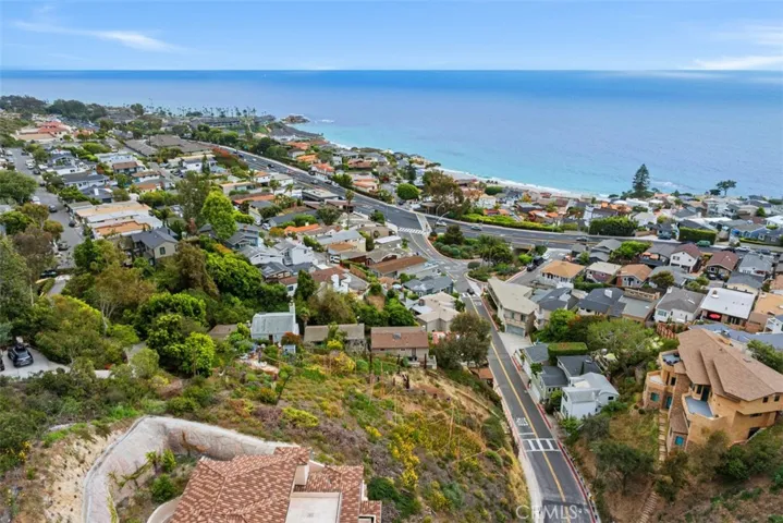 Build your dream home at this beautiful location, in an already established neighborhood! Please note, this image shows two lots. Lot for sale is closest to the ocean. Fencing in front shows the lot for sale.
