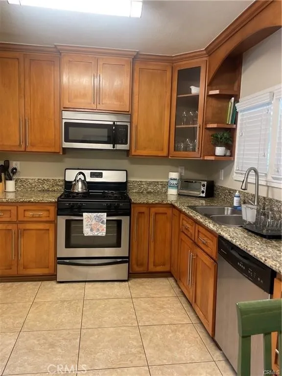 Gas stove, microwave and dishwasher.