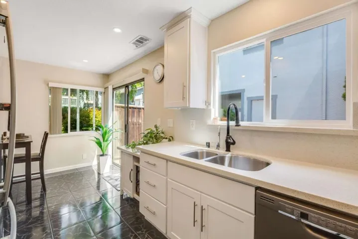 Abundant windows and door, creating a bright and airy atmosphere