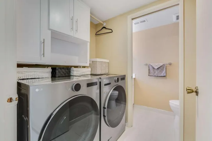 A functional laundry room with built-in storage
