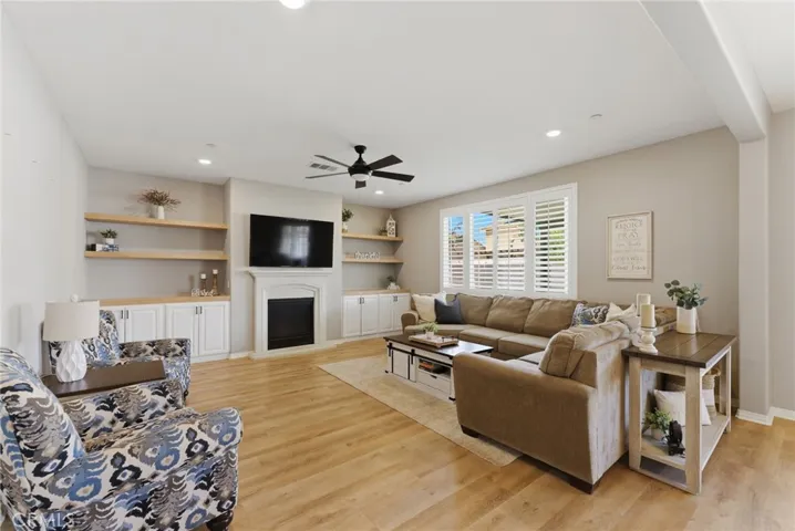 Spacious living area w/ fireplace.