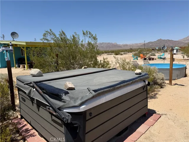 There’s a heated spa and a cowboy pool for use in the fence yard