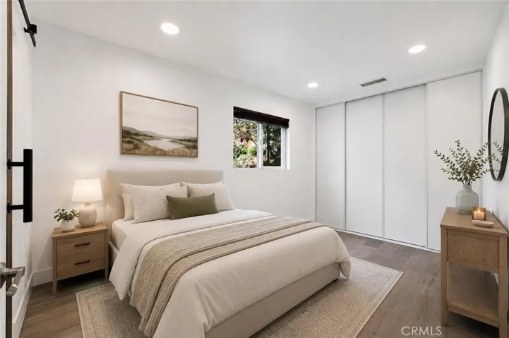 Primary Bed - This image is virtually staged.