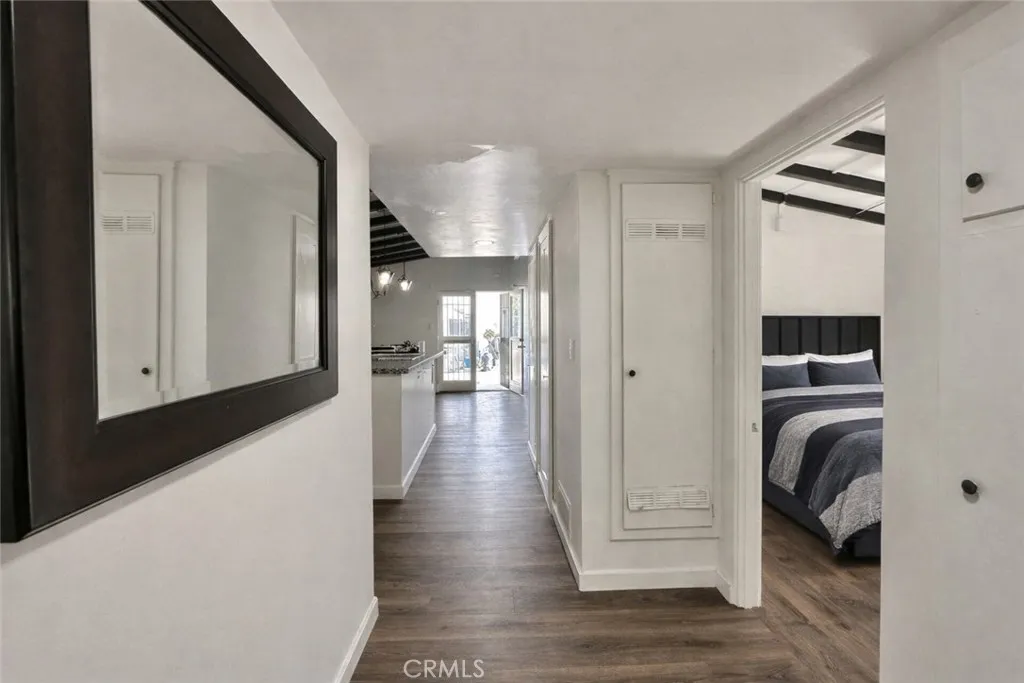 Hallway adjacent to the 3 bedrooms and bathroom