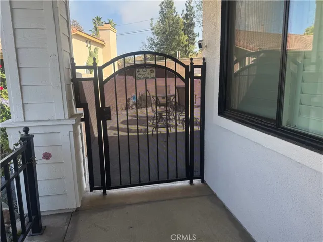 Close up view of front gate to pool.