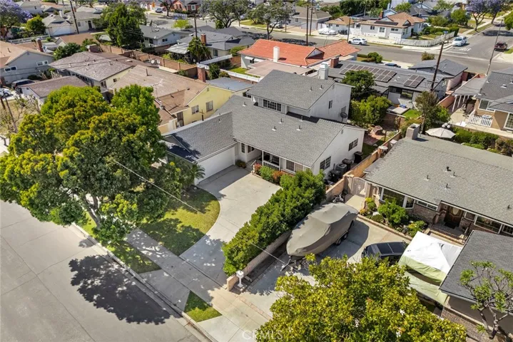 Aerial view of 1835 W. Chateau, showing beautiful curb appeal and amazing, mature tree in front yard.