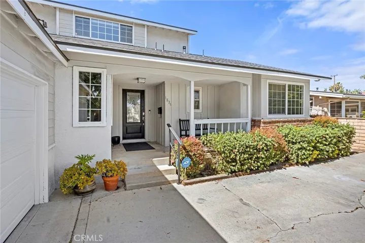 Beautiful curb appeal, with cute porch!