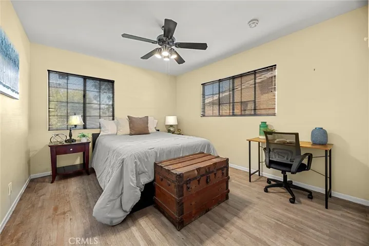 Bedroom #3 - main level secondary bedroom w/ ceiling fan.