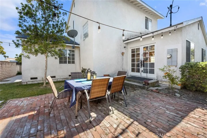 Another view of backyard patio area, double doors lead to Family Room.
