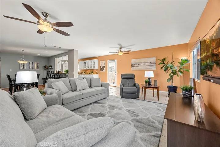 Another view of the Family Room, Dining Room behind on left, Kitchen on right.