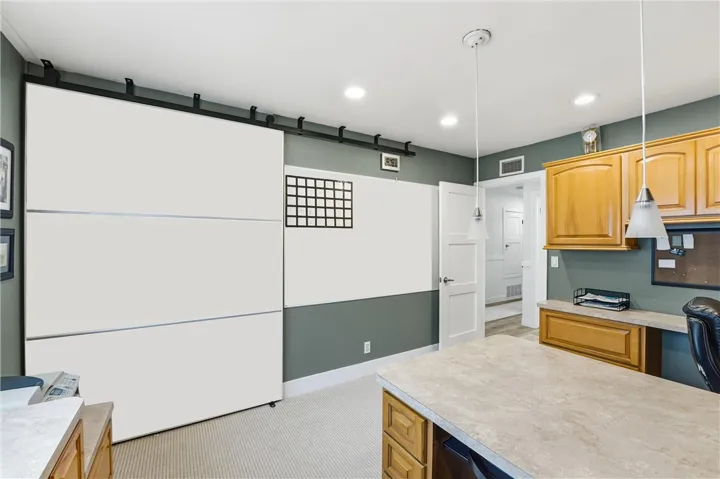 Sliding barn door doubles as a white board