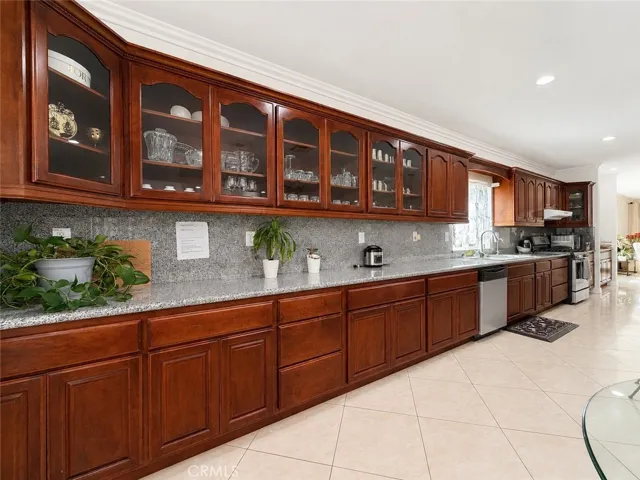 Extensive bank of cabinetry in this kitchen for all your storage needs