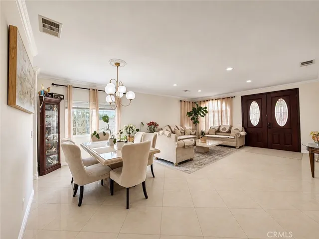 Gracious living at its finest. Double doors at the entrance with stained glass accents