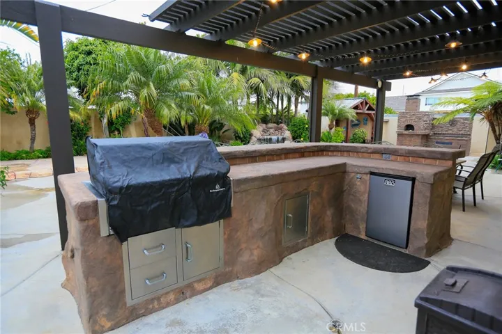 Rock BBQ Island with Built-In refrigerator and Storage