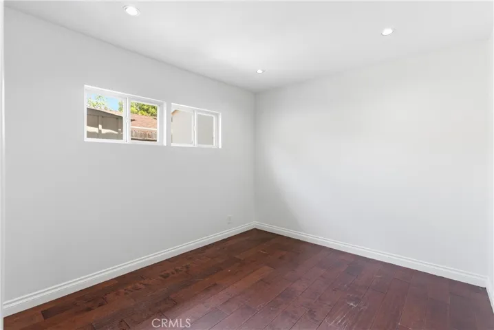 Bedroom 4 with dual closet doors