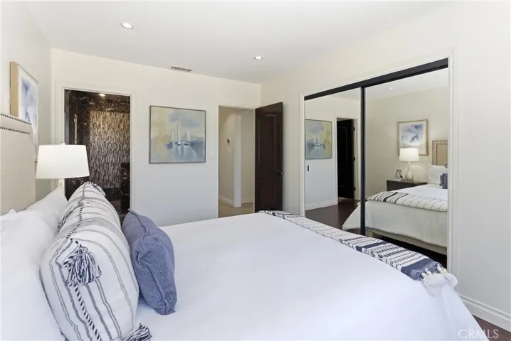 Another view of the primary bedroom