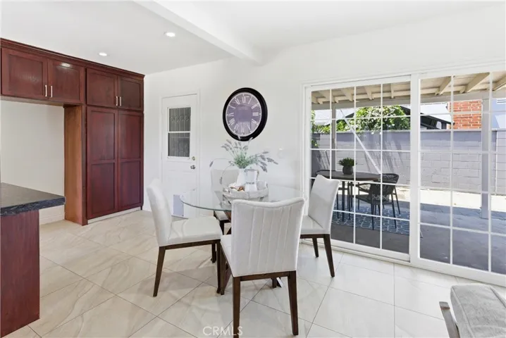 Plenty of natural light flowing into the dining area through the sliding door