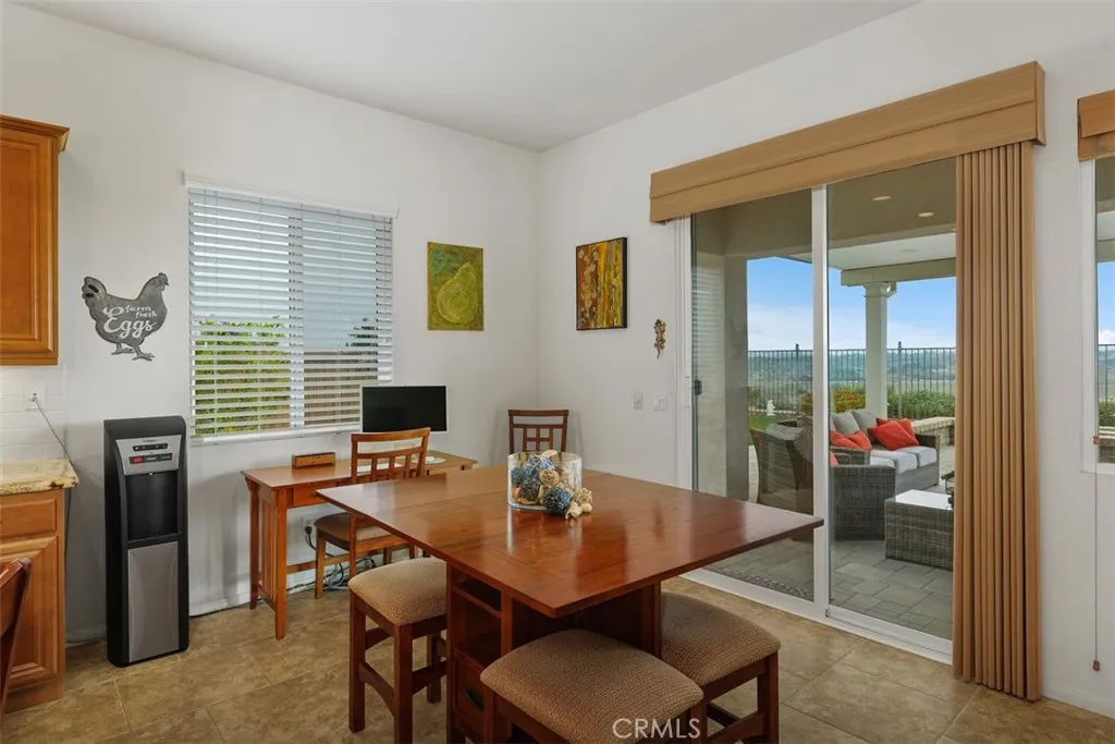 A prefect space for additional dining, a writing/computer desk and access to outdoor entertainment!