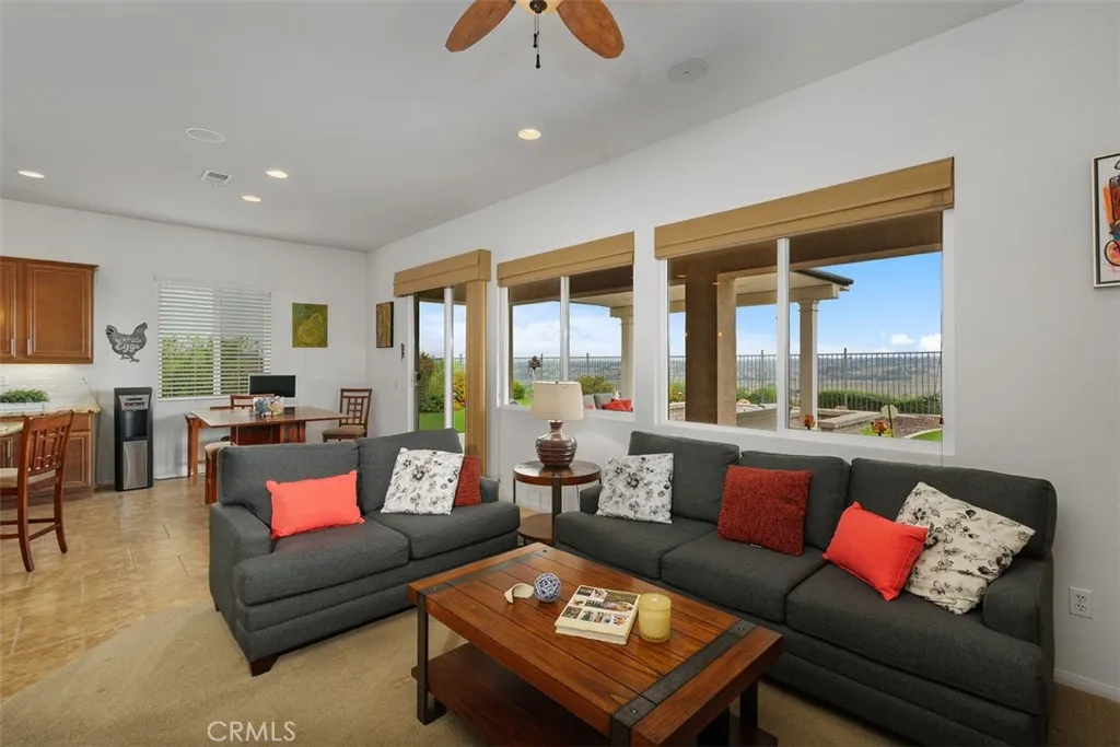 The Family Room open to the Kitchen and has direct access to the backyard for dining Al Fresco!