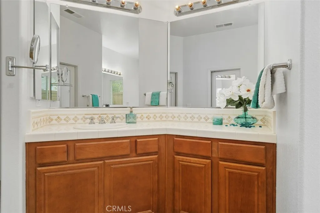 Two Vanities in the Primary Bathroom, plus two walik-in closets.