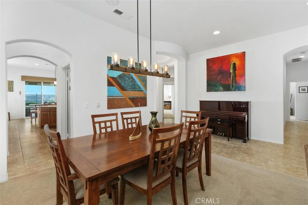 Formal Dining Room, connects to the Kitchen via a Bulter's Pantry adjacent to a large walk-in Pantry.