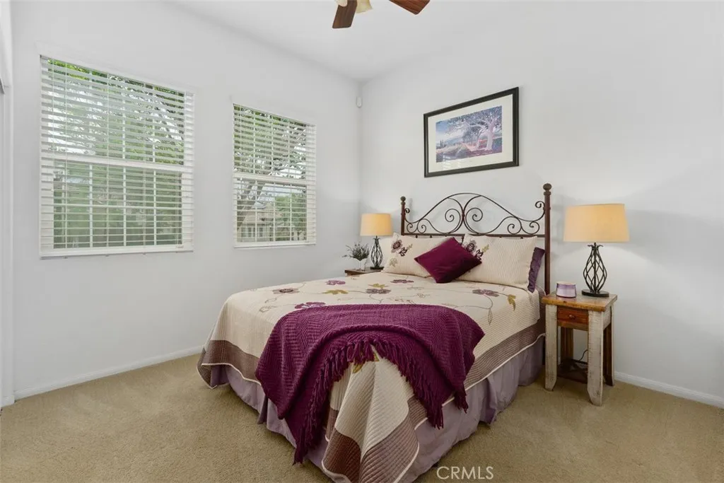 Secondary Bedroom off the front entry next to a full Bathroom perfect for family or guests.