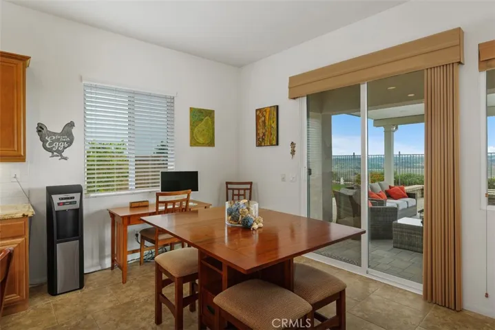 A prefect space for additional dining, a writing/computer desk and access to outdoor entertainment!