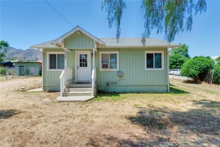 Notice the custom front door and the newer windows.