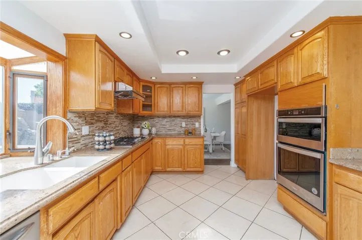 Kitchen- recessed lighting and granite countertop