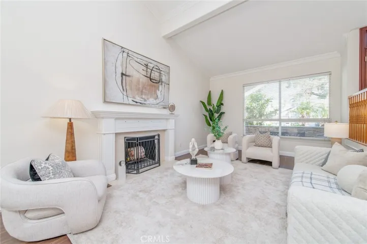 Living Room- vaulted ceiling with fireplace