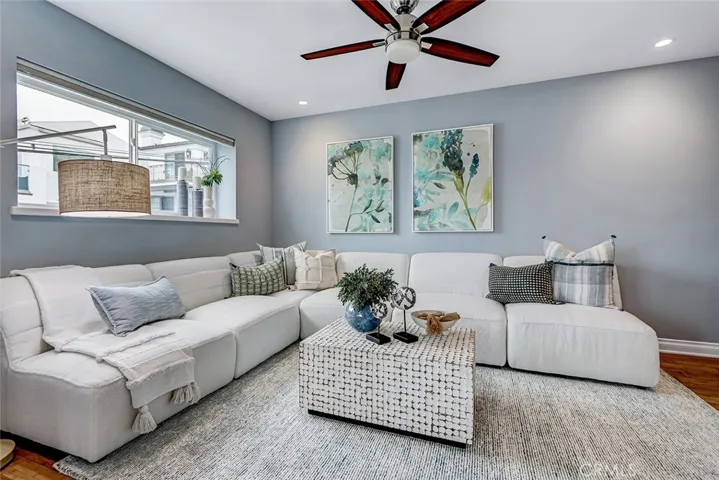Spacious living area with powder bath could also function as a guest suite with closet.