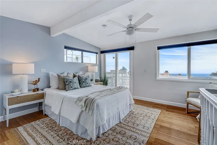 Exquisite top floor great room with exceptional views is very flexible as a bedroom, great room or office leading to your private viewing deck.