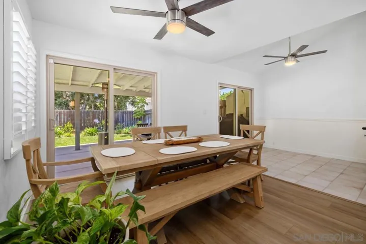 Expanded dining area with access to the back patio and yard makes for amazing indoor/outdoor living.