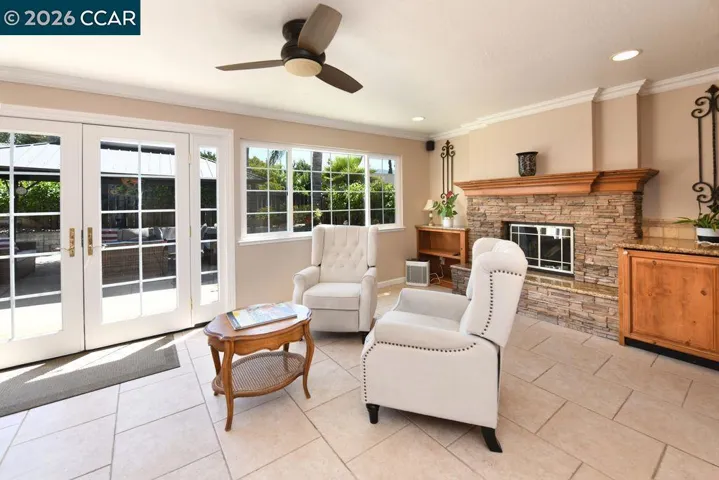 Stone Gas Fireplace & French Doors