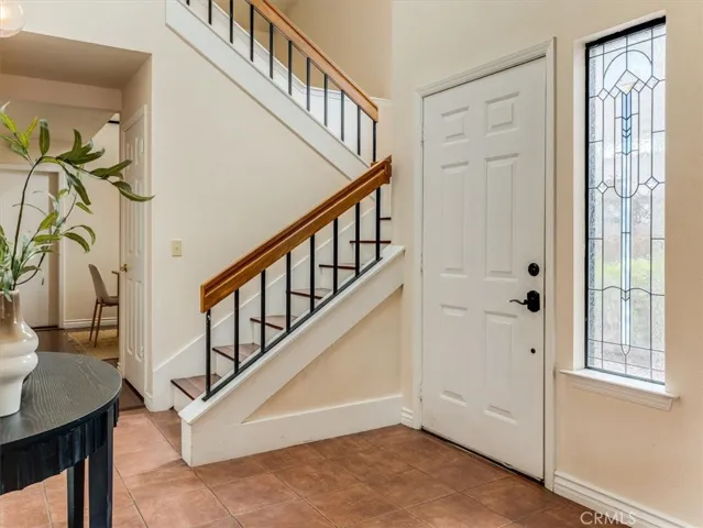 Enter into the designated foyer space.