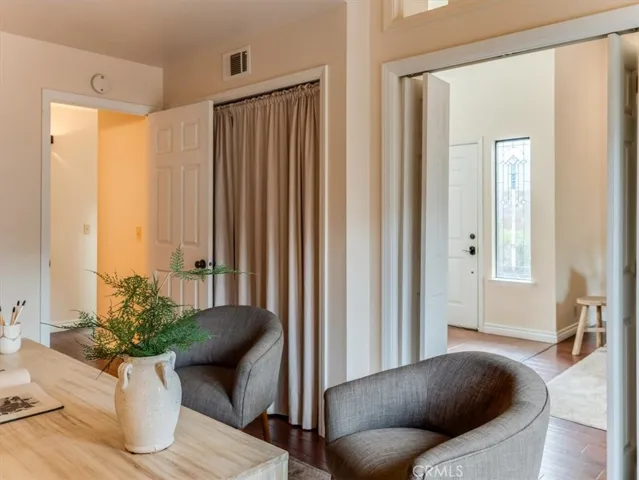 This room does have a closet and door leading to the hallway that hosts the 1/2 bath.