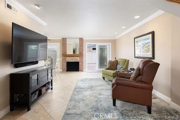 family room looking toward fireplace and sliding doors