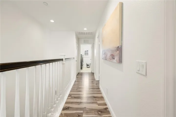 Hallway to laundry room, secondary bathroom & secondary bedroom