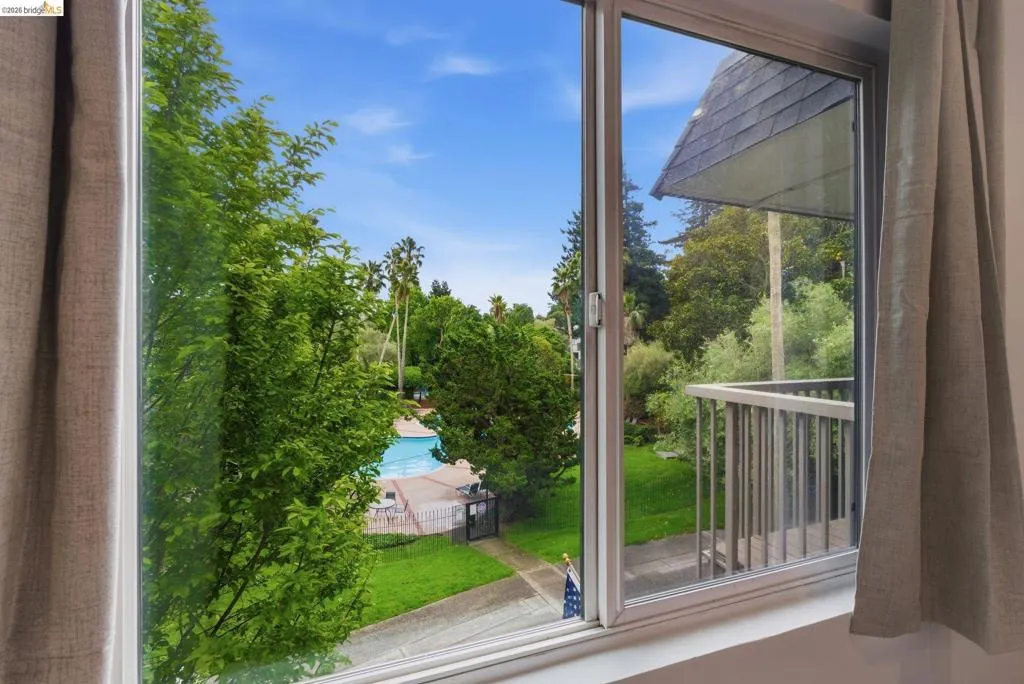 Sliding glass door opening to a private balcony