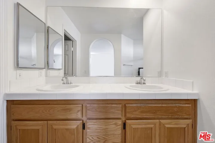 primary bathroom with double s