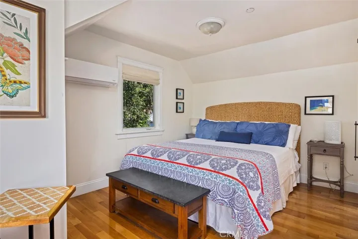 ADU bedroom area with mini-split for climate control.