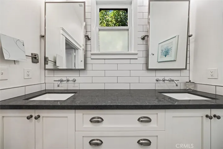 Dual vanity in primary bathroom.