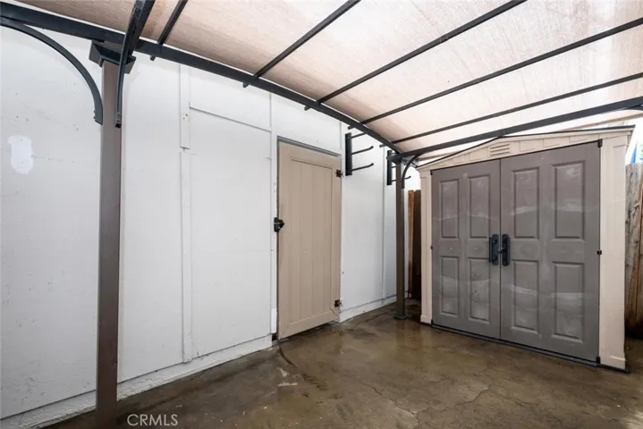 Patio leading to carport