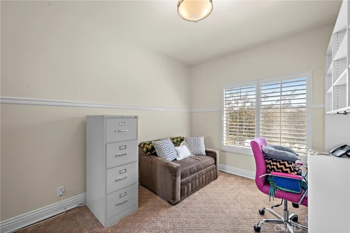 Secondary Bedroom w Built in Desk & Plantation Shutters