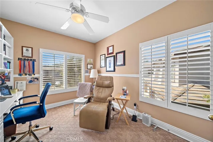 Secondary Bedroom w Built-In Desk, Plantation Shutters, Ceiling Fan