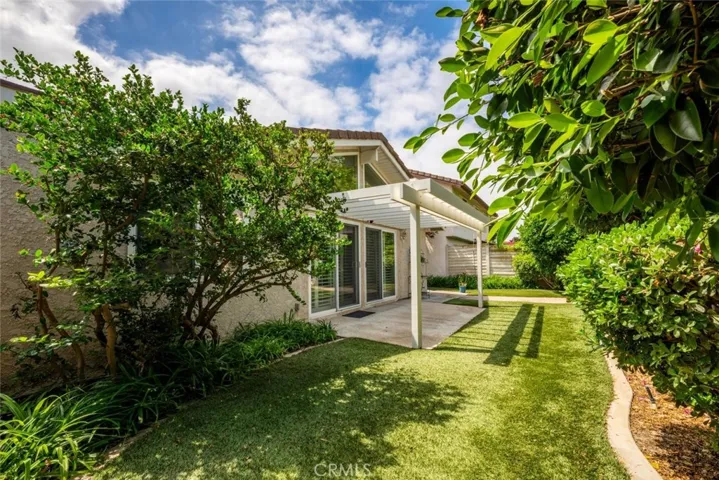 Fruit trees help create a private oasis.